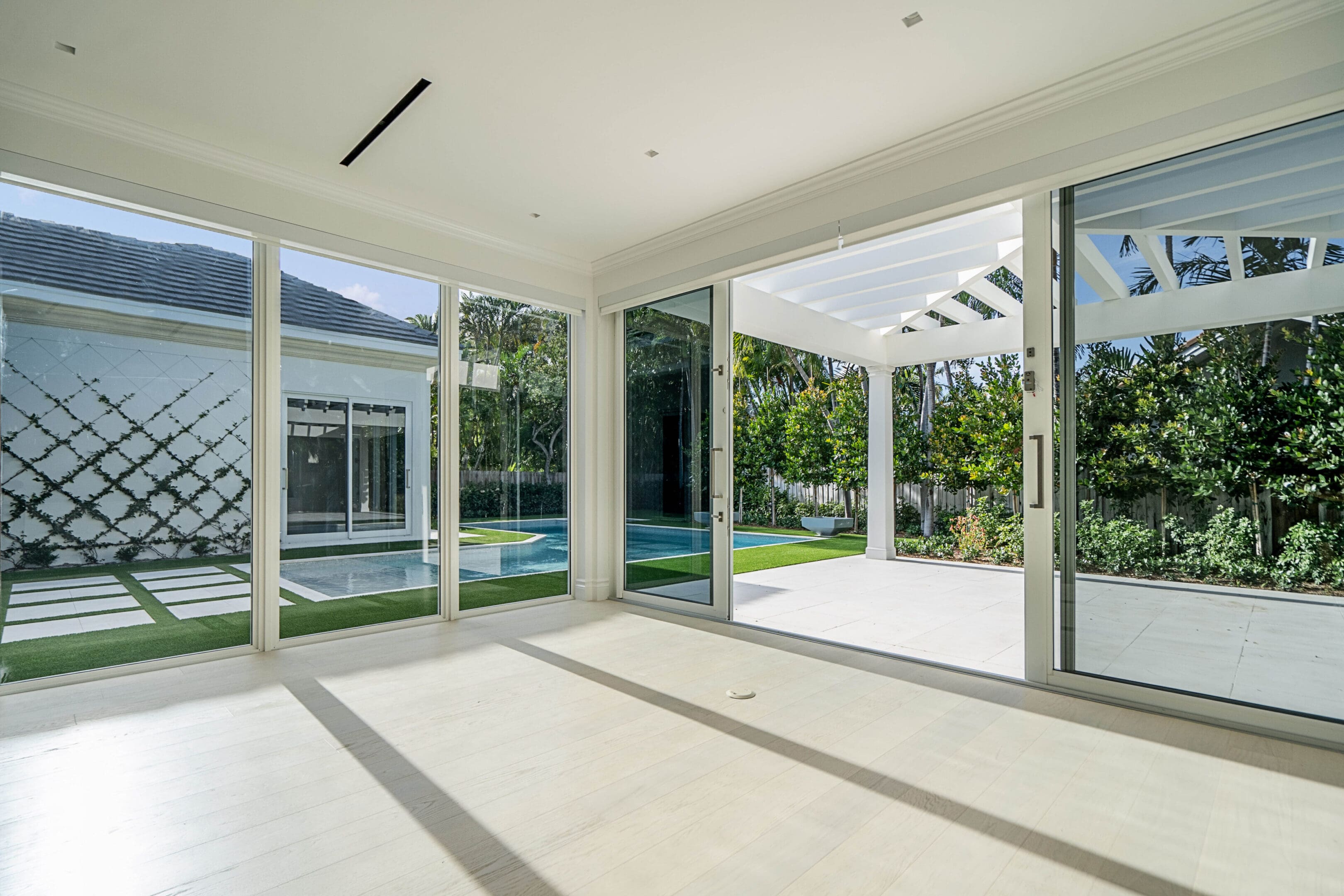 A large open room with sliding glass doors.